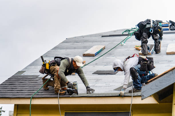 Professional Gutter Installation technician working in Fairfax, OK